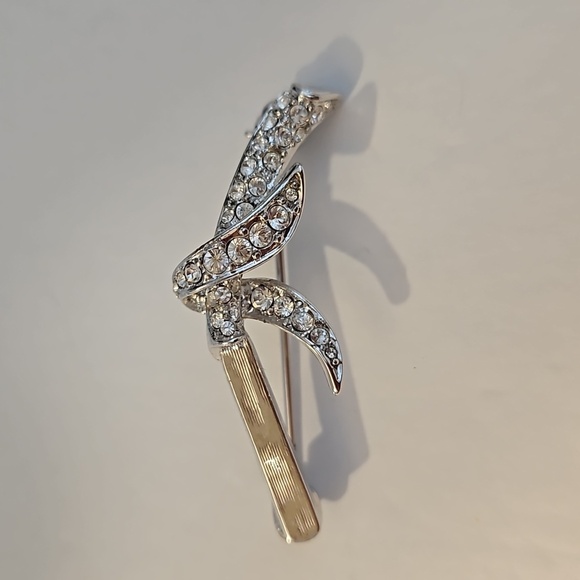 NOLAN MILLER Rhinestone & Silvertone Brooch. - Picture 1 of 7